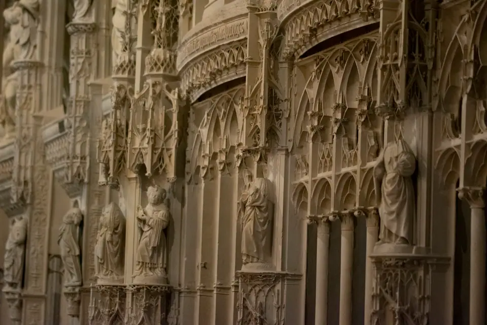 Carved canopies and standing figures along the Chartres Cathedral choir screen