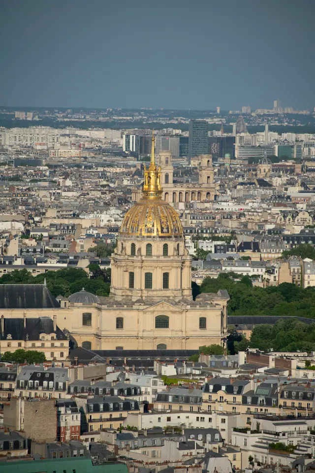 The gilded dome of Les Invalides rising above the Paris rooftops, seen from above